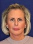 a lady with blond chin-length hair